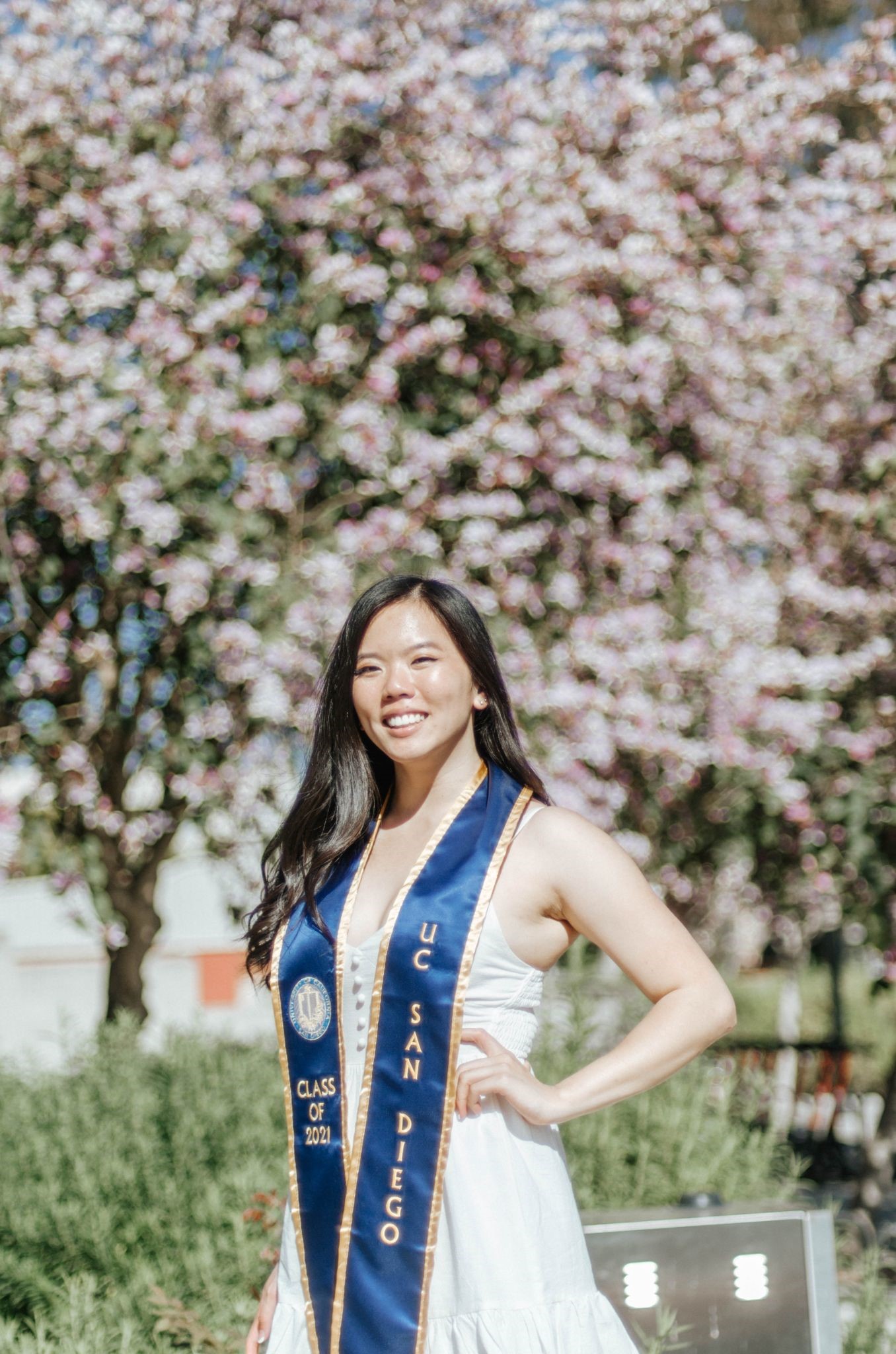 person in front of the flowers at the Price Center