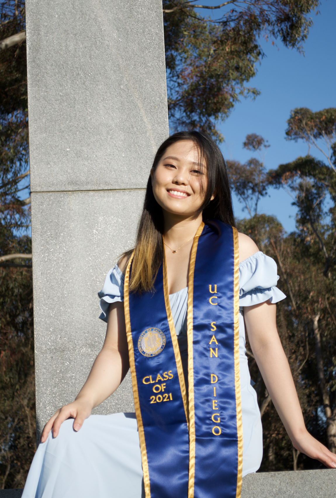 Person in front of Stone Henges UCSD