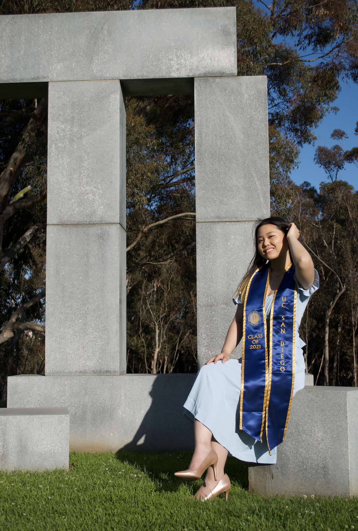 Person in front of Stone Henges UCSD