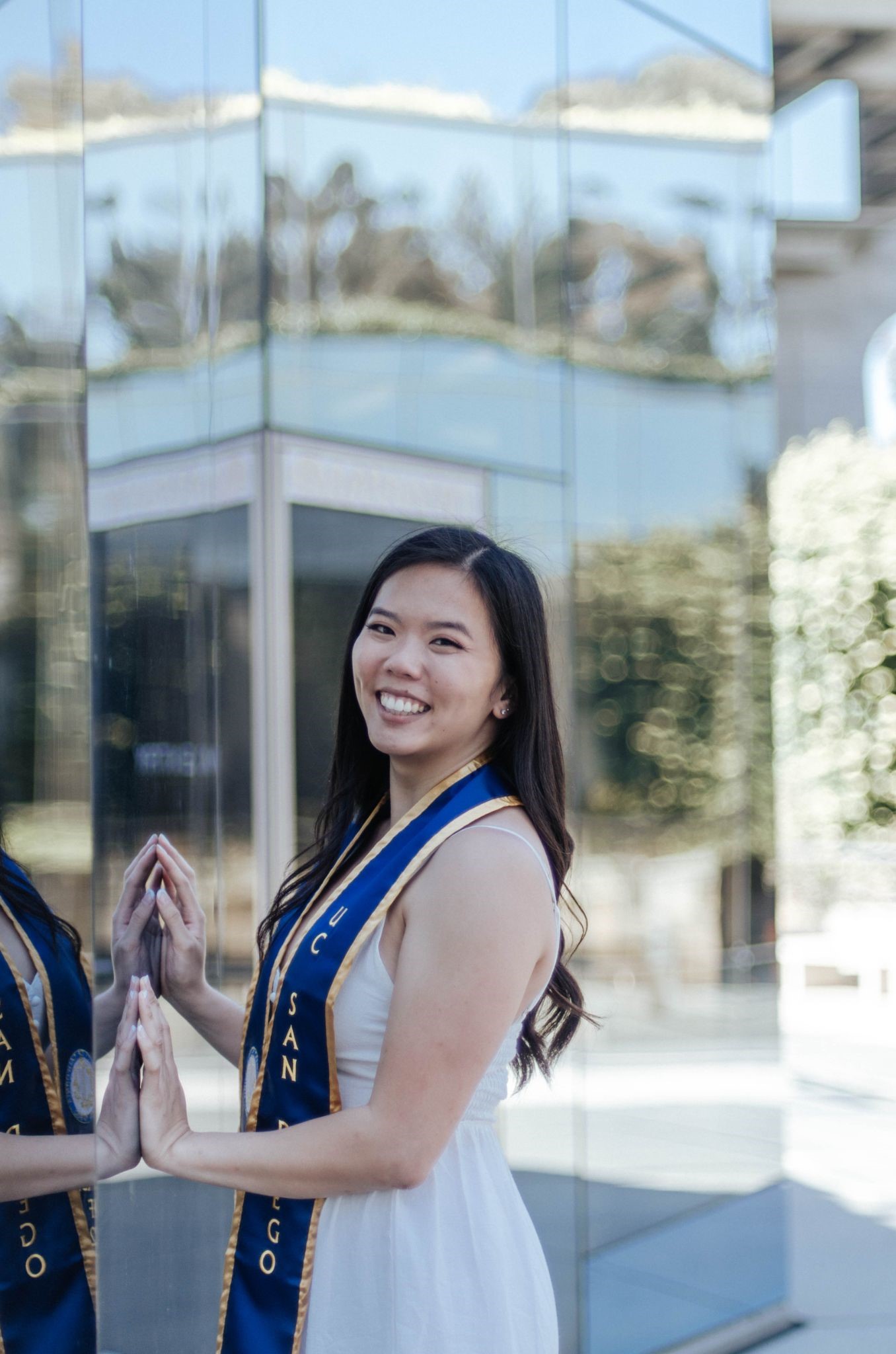 person in front of Geisel Library