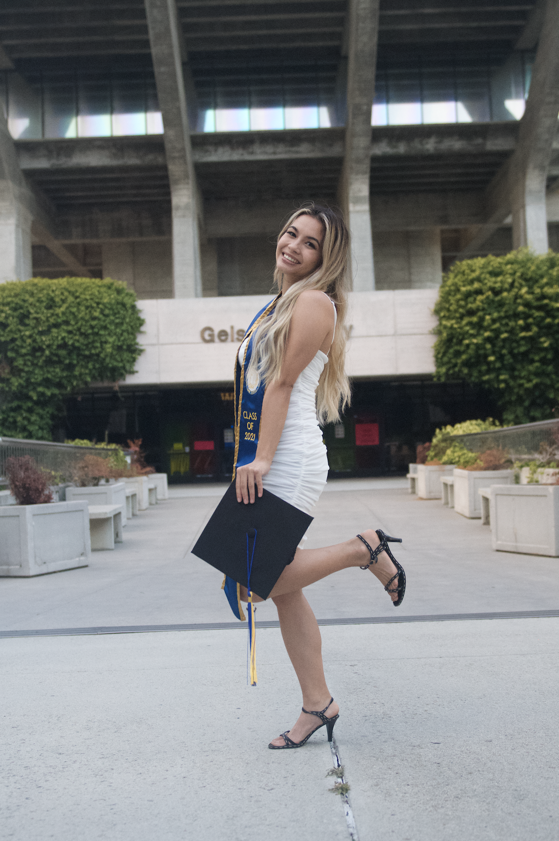 person in front of Geisel Library