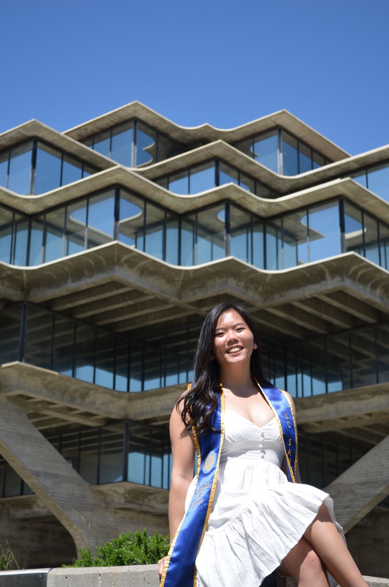 person in front of Geisel Library